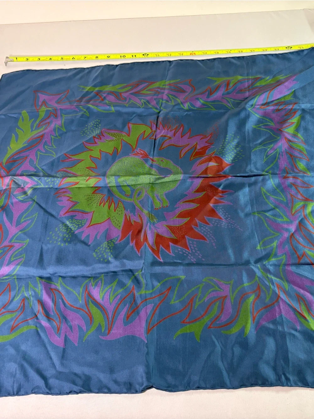 Vibrant Blue Silk Scarf with Multicolor Flame Motif